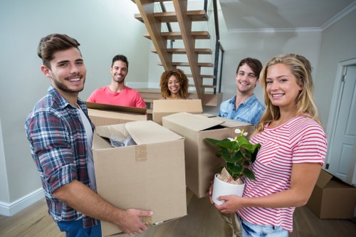 Professional man and van team handling bulky item delivery in Waterloo