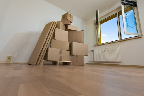 Packing and loading household items for a Waterloo home removal service