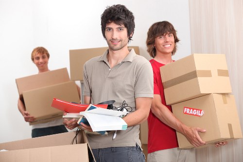 Office staff handling a formal complaint record