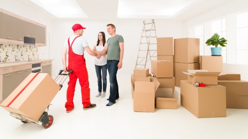 Local packing team organizing household items for a Waterloo flat relocation